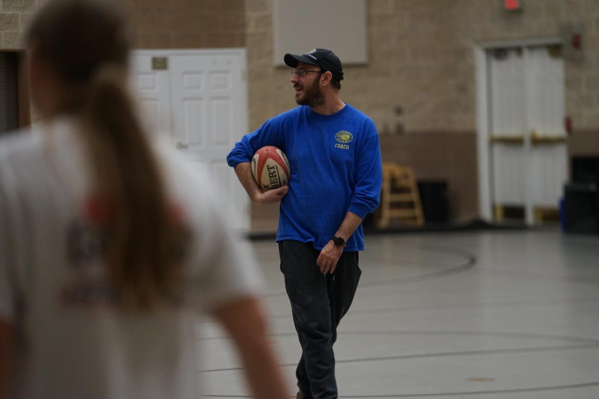 Nov 13. Assistant coach Andy Markowitz runs through drills with the team, helping them understand the concept and importance of the drill and how it correlates to playing on the field. 
