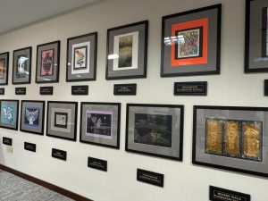 Artworks from young artists are showcased on the CCS board meeting room. Each semester, exceptional young artists from across our schools are chosen to showcase their work for a Young Artist Award.