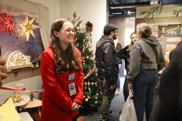 Sophomore Ellen Rozmaryn volunteers at a small museum in Christkindlmarkt. Rozmaryn said this experience strengthened her connections to the community.