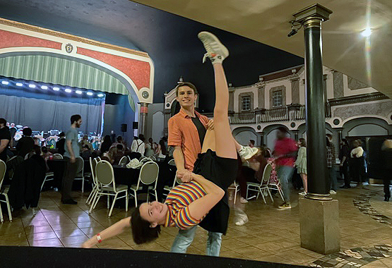 Junior Eva Marci and senior AJ Lehikoinen pose at a swing dance event in Indianapolis. (Submitted photo: Eva Marci)