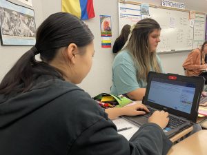 Amy Cui, Quiz Bowl member and freshman, answers practice questions on QB Reader, a Quiz Bowl practice site. 