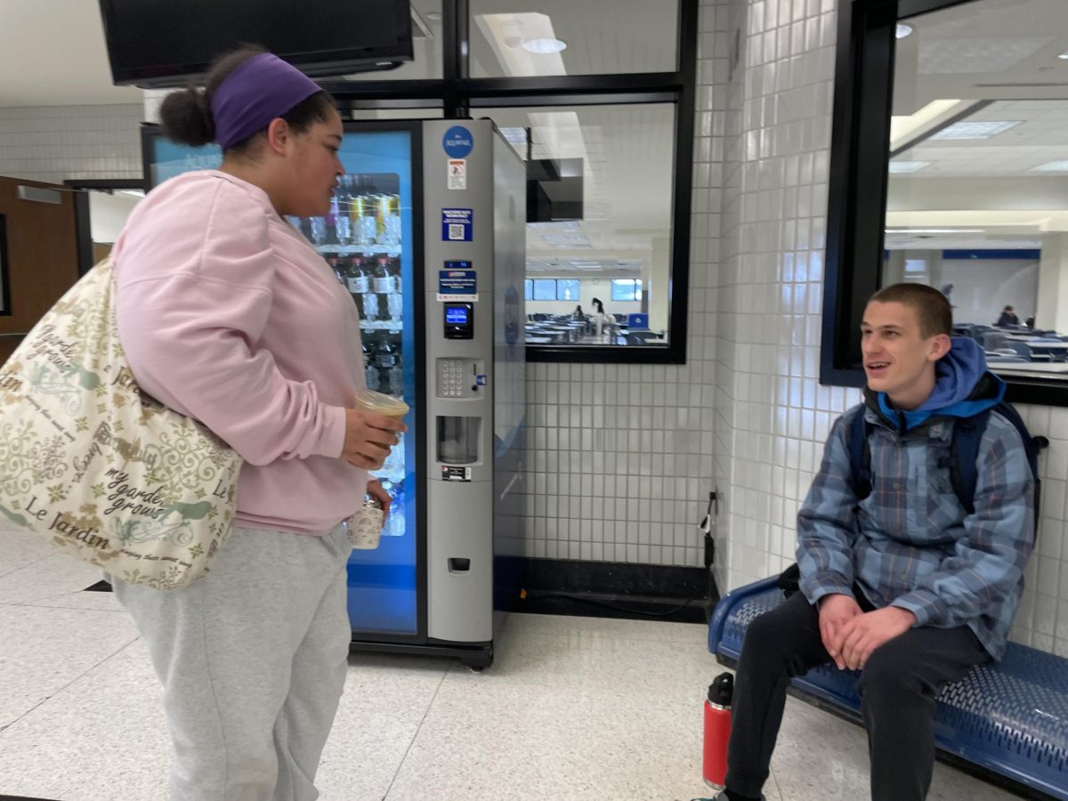 Seniors Gaia Shields (left) and Miles Habegger (right) discuss the two hour delay before school on Mar. 2. CHS had a two hour delay due to cold weather and snow conditions. “I don’t like two hour delays,” Shields said. “It messes up my days and the school schedule is confusing, I would rather a snow day.” 