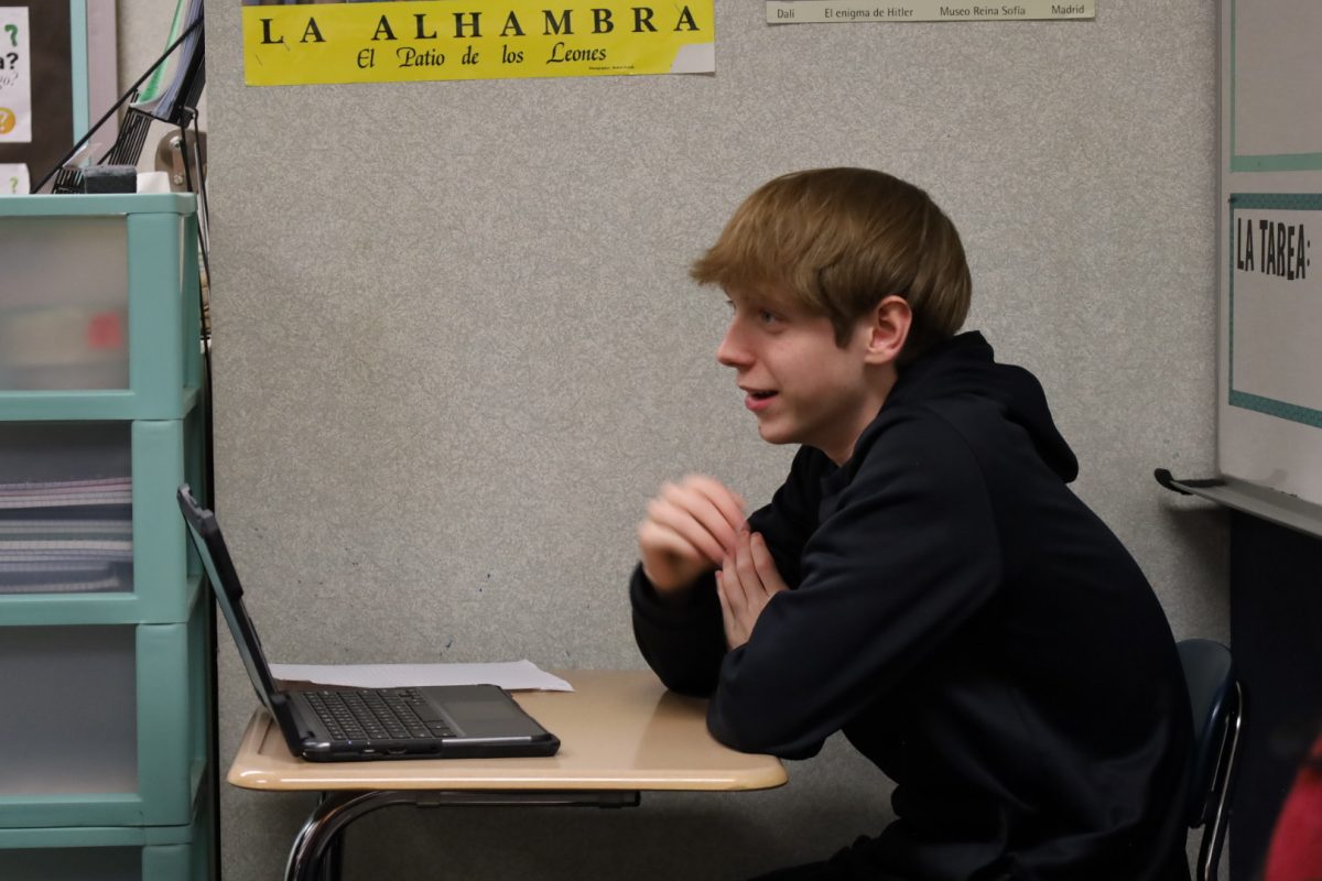 Junior Joshua Martin converses with other members of the Japanese Culture Club (JCC) on Feb. 24. JCC held their meeting at the end of February and did origami.