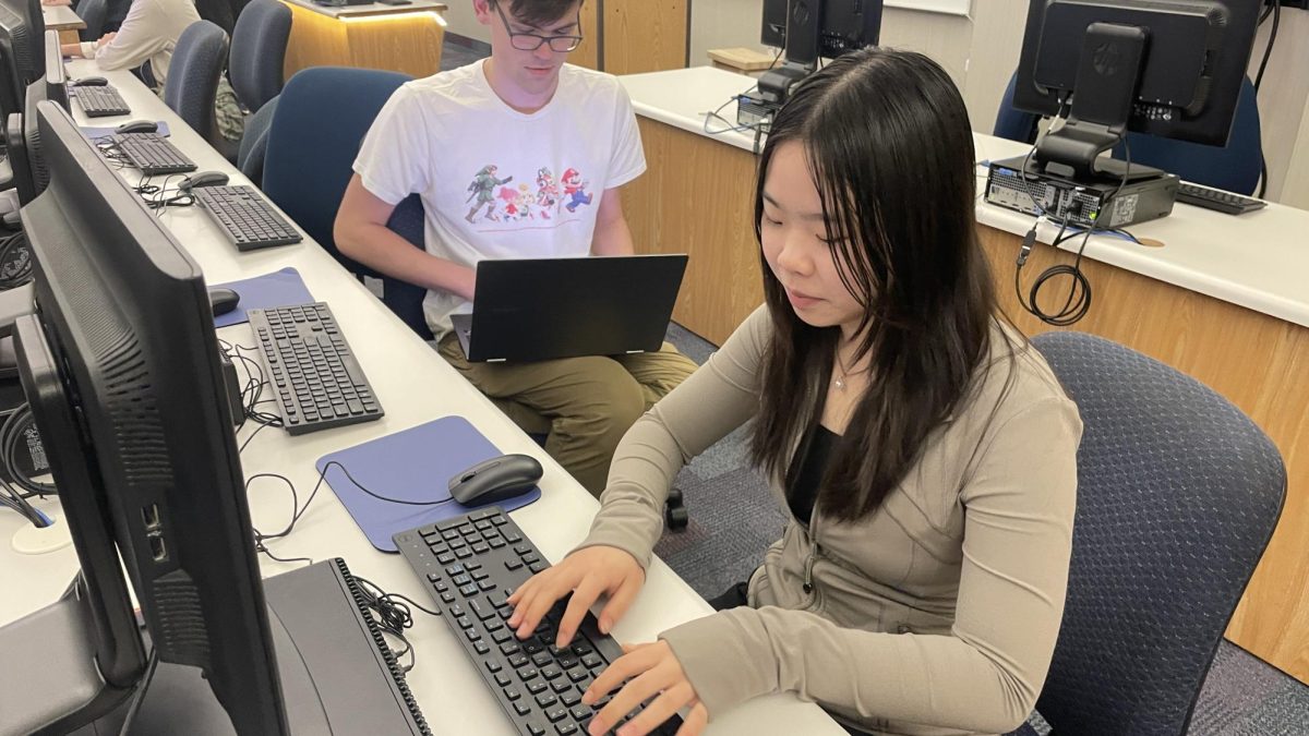 During school, Allison Shen, club president and senior, writes questions for club members to practice with during meetings. She used school computers to upload the questions she wrote for mock tests. “It’s fun to write problems because I can incorporate the names of members into the questions. Then, during the meetings they ask me how they’re finding 3.1415 bananas,” Shen said. 