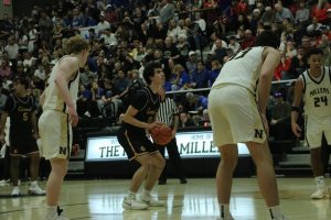 Junior Vincent Nover (11) looks looks to shoot a free throw during the sectional semifinal on March 6. The Greyhounds defeated the Millers 44-30 to advance to the sectional championship game.